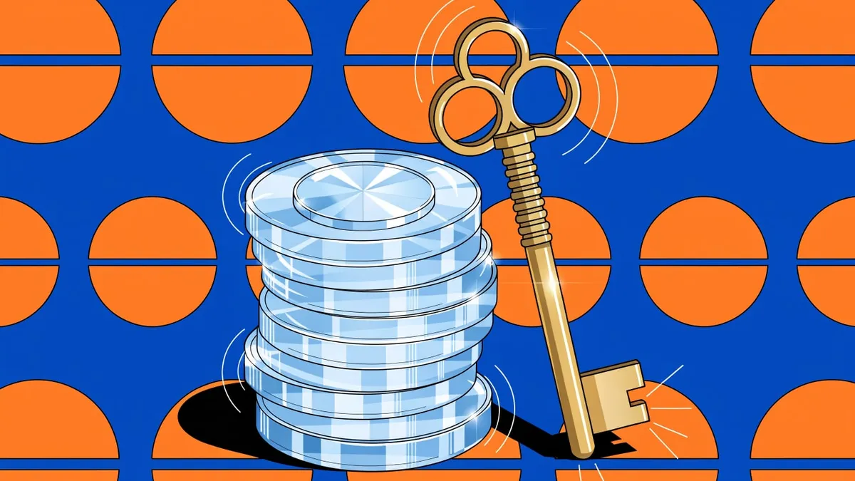 A stack of pale blue translucent glass coins leaning beside a tall brass key with a three-looped bow, on a blue background patterned with orange half-circles split by thin black lines.