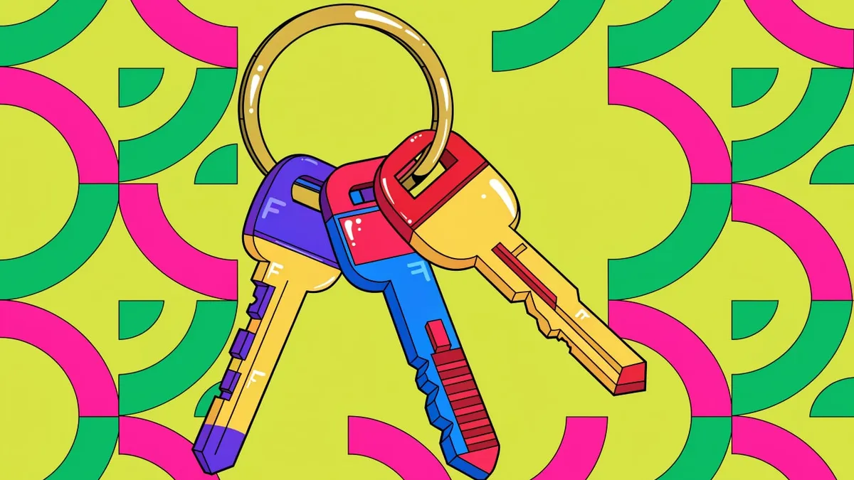 A brass key ring holding three keys with purple, blue and red heads and yellow blades, on a yellow-green background patterned with pink and green quarter-circle arcs.
