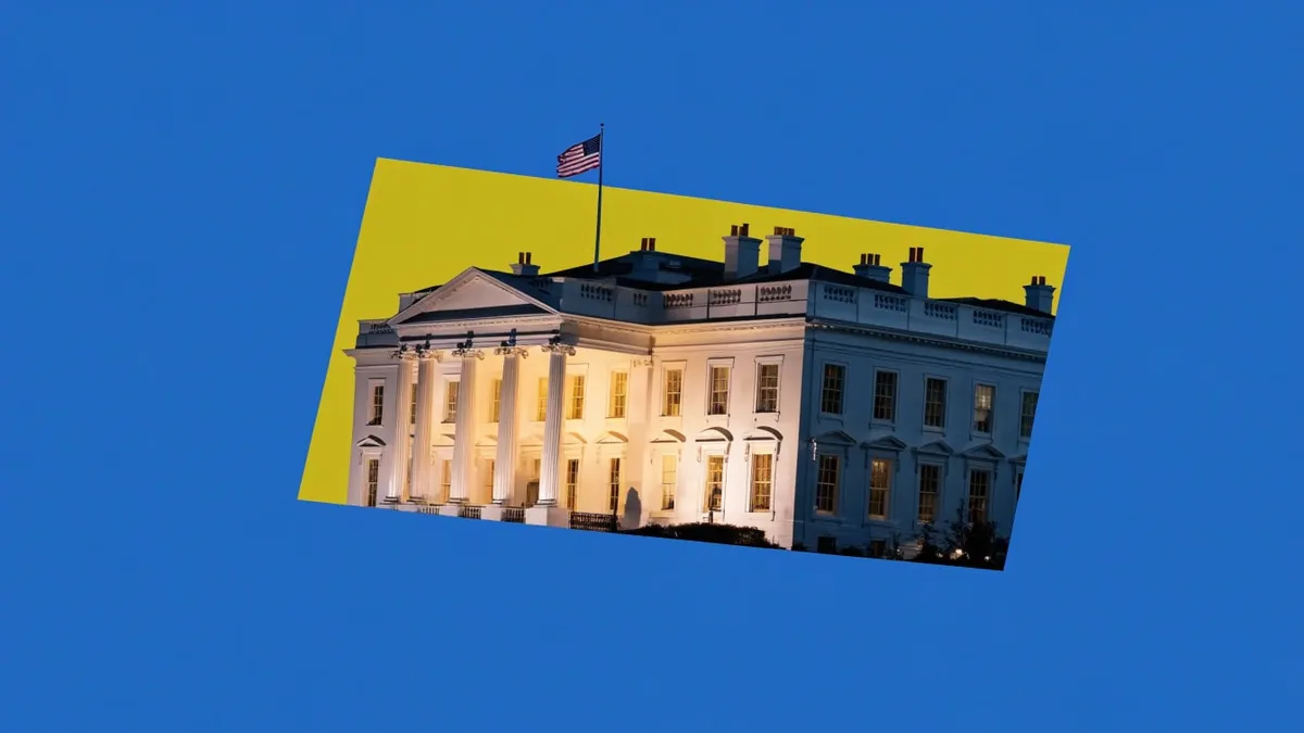 The White House at night, cut out against a solid bright color.